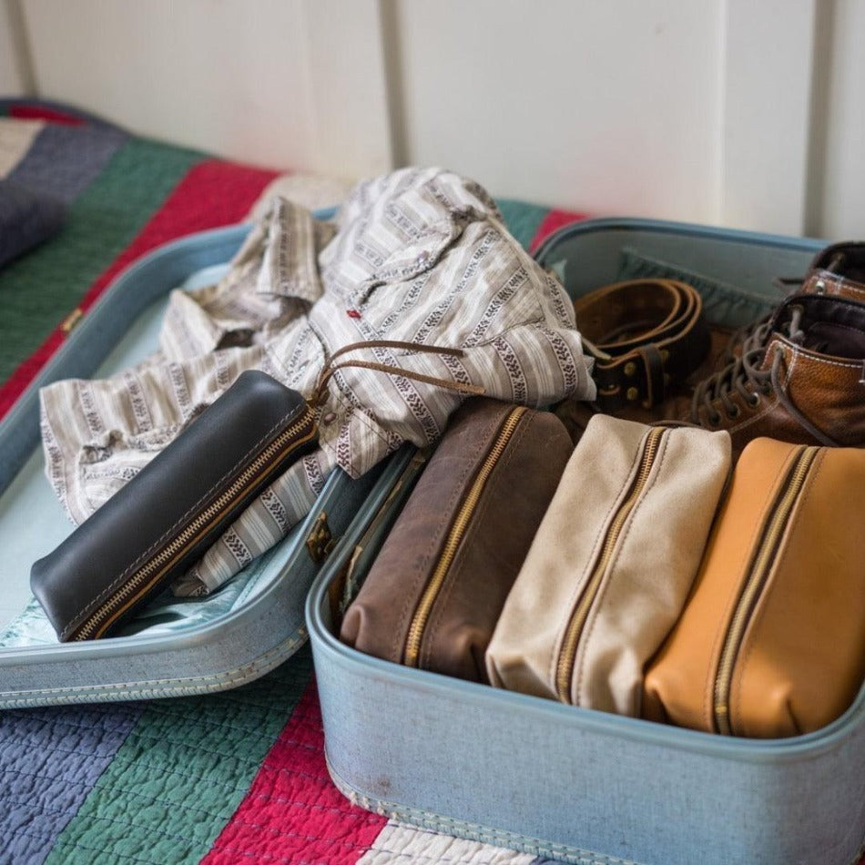 
                  
                    Experience luxury and reliability with High Line Leather Pouch. Crafted with premium-grade leather and robust brass zippers, this pouch comes in three sizes to suit your lifestyle. Whether for the office, an outdoor adventure, or traveling the globe, this pouch will keep your things protected and stylishly stored.
                  
                