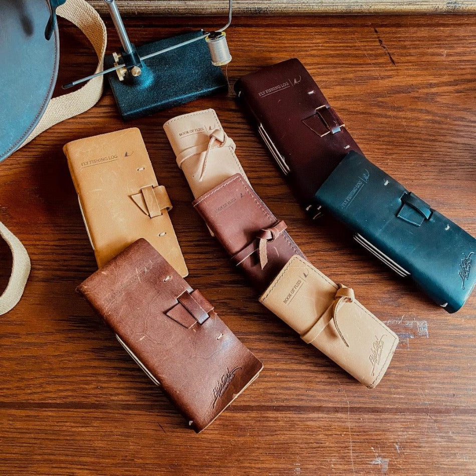 
                  
                    One of our favorites, the Leather Book of Flies keeps your flies dry in style. Handcrafted with genuine top-grain leather, the Book of Flies is designed to hold up to 20 of your best tied flies. You'll be ready to take on your next fly-fishing adventure with ease. The high-quality leather provides a protective and stylish home for your favorite flies.
                  
                