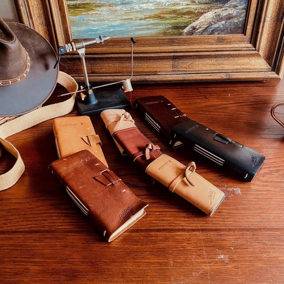 
                  
                    One of our favorites, the Leather Book of Flies keeps your flies dry in style. Handcrafted with genuine top-grain leather, the Book of Flies is designed to hold up to 20 of your best tied flies. You'll be ready to take on your next fly-fishing adventure with ease. The high-quality leather provides a protective and stylish home for your favorite flies.
                  
                