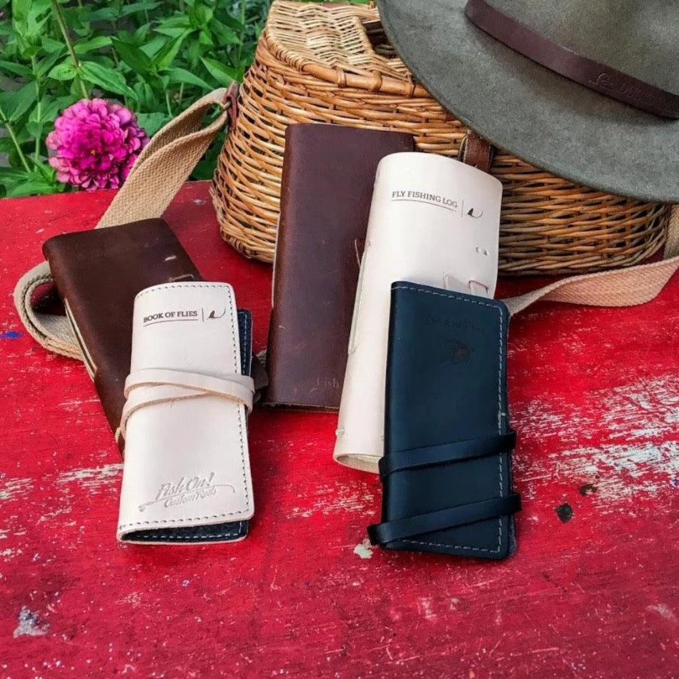 
                  
                    Leather Book of Flies - Fish On! Custom Rods One of our favorites, the Leather Book of Flies keeps your flies dry in style. Handcrafted with genuine top-grain leather, the Book of Flies is designed to hold up to 20 of your best tied flies. You'll be ready to take on your next fly-fishing adventure with ease. The high-quality leather provides a protective and stylish home for your favorite flies.
                  
                
