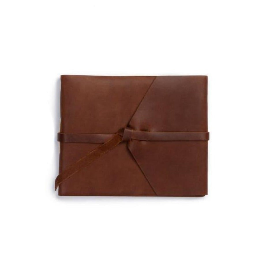 
                  
                    Whether you own a B&B or you're simply trying to capture memories from your wedding, special events or hunting club, our Leather Guest Registry ticks all the boxes.  It features top-grain leather, a hand-sewn binding, and comes with either flap-tie or buckle closure.  
                  
                