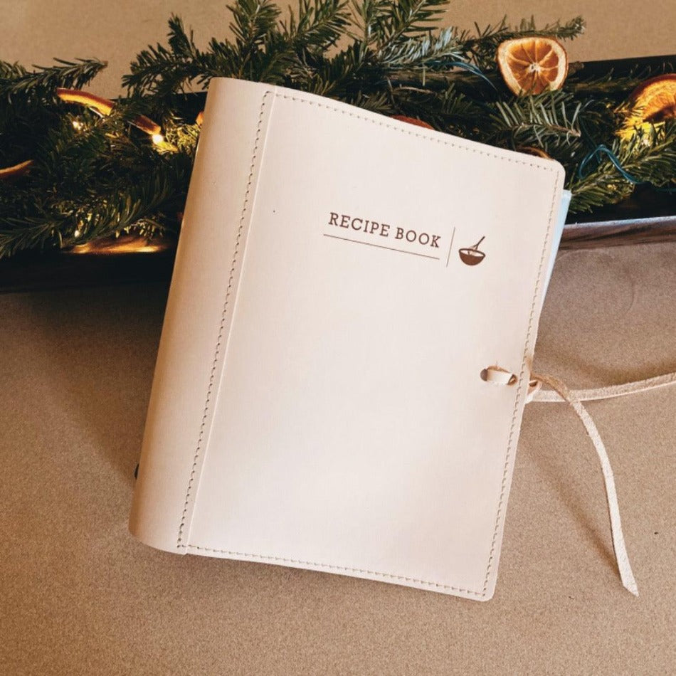 
                  
                    Leather Recipe Binder  This Leather Recipe Binder is a classic way to store all your cherished recipes! Choose from two sizes and get your collection going with plastic page protectors, plus blank 4x6 recipe cards. Keep adding to it for years to come and your recipe book will only get better! It sounds tasty!
                  
                