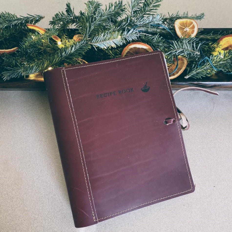 
                  
                    Leather Recipe Binder  This Leather Recipe Binder is a classic way to store all your cherished recipes! Choose from two sizes and get your collection going with plastic page protectors, plus blank 4x6 recipe cards. Keep adding to it for years to come and your recipe book will only get better! It sounds tasty!
                  
                