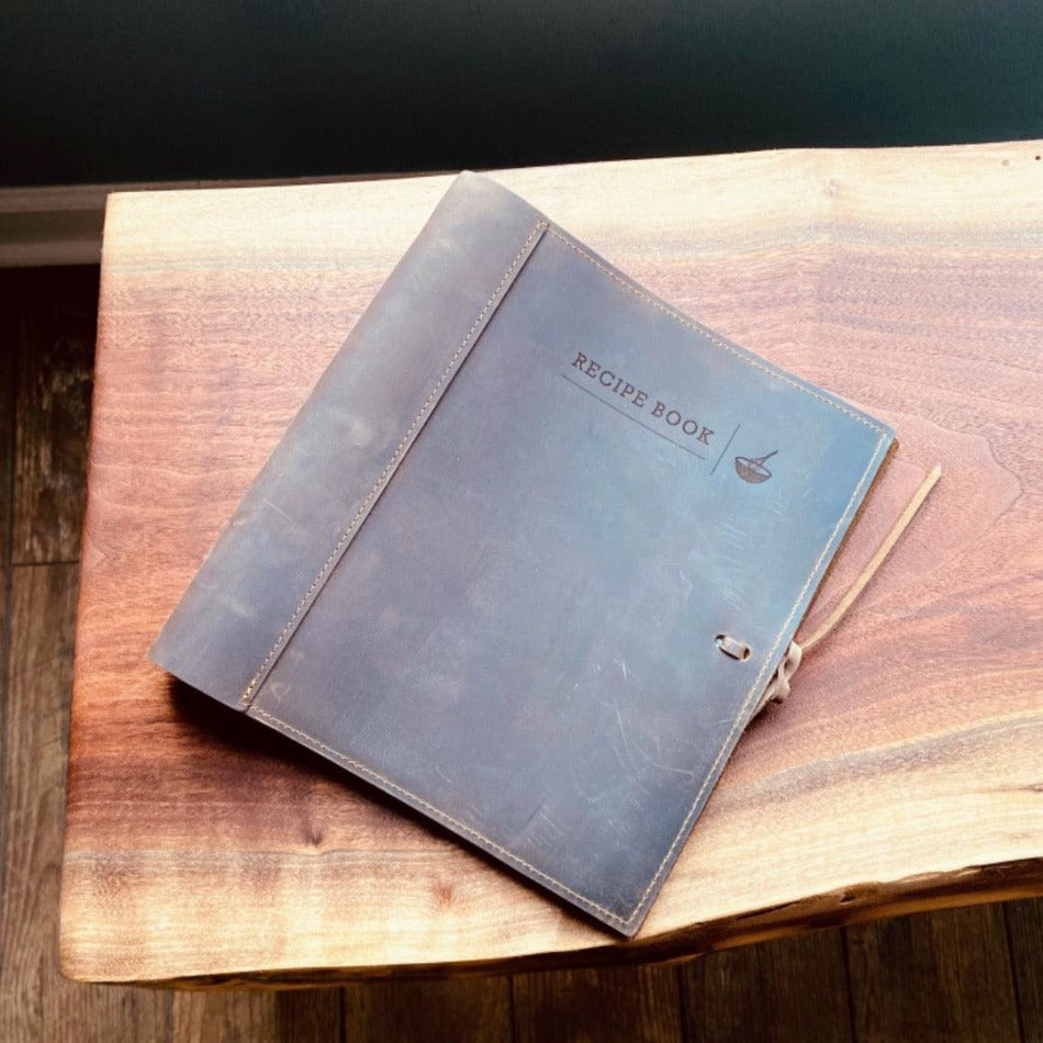 
                  
                    Leather Recipe Binder  This Leather Recipe Binder is a classic way to store all your cherished recipes! Choose from two sizes and get your collection going with plastic page protectors, plus blank 4x6 recipe cards. Keep adding to it for years to come and your recipe book will only get better! It sounds tasty!
                  
                