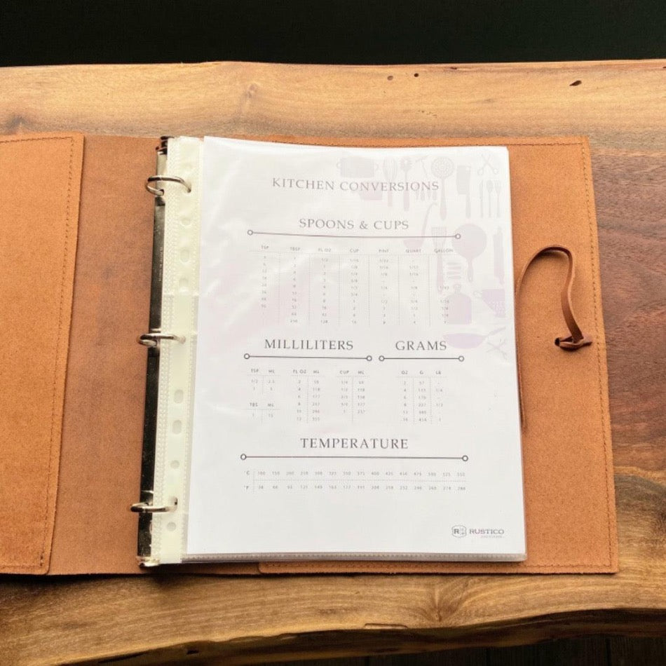 
                  
                    Leather Recipe Binder  This Leather Recipe Binder is a classic way to store all your cherished recipes! Choose from two sizes and get your collection going with plastic page protectors, plus blank 4x6 recipe cards. Keep adding to it for years to come and your recipe book will only get better! It sounds tasty!
                  
                