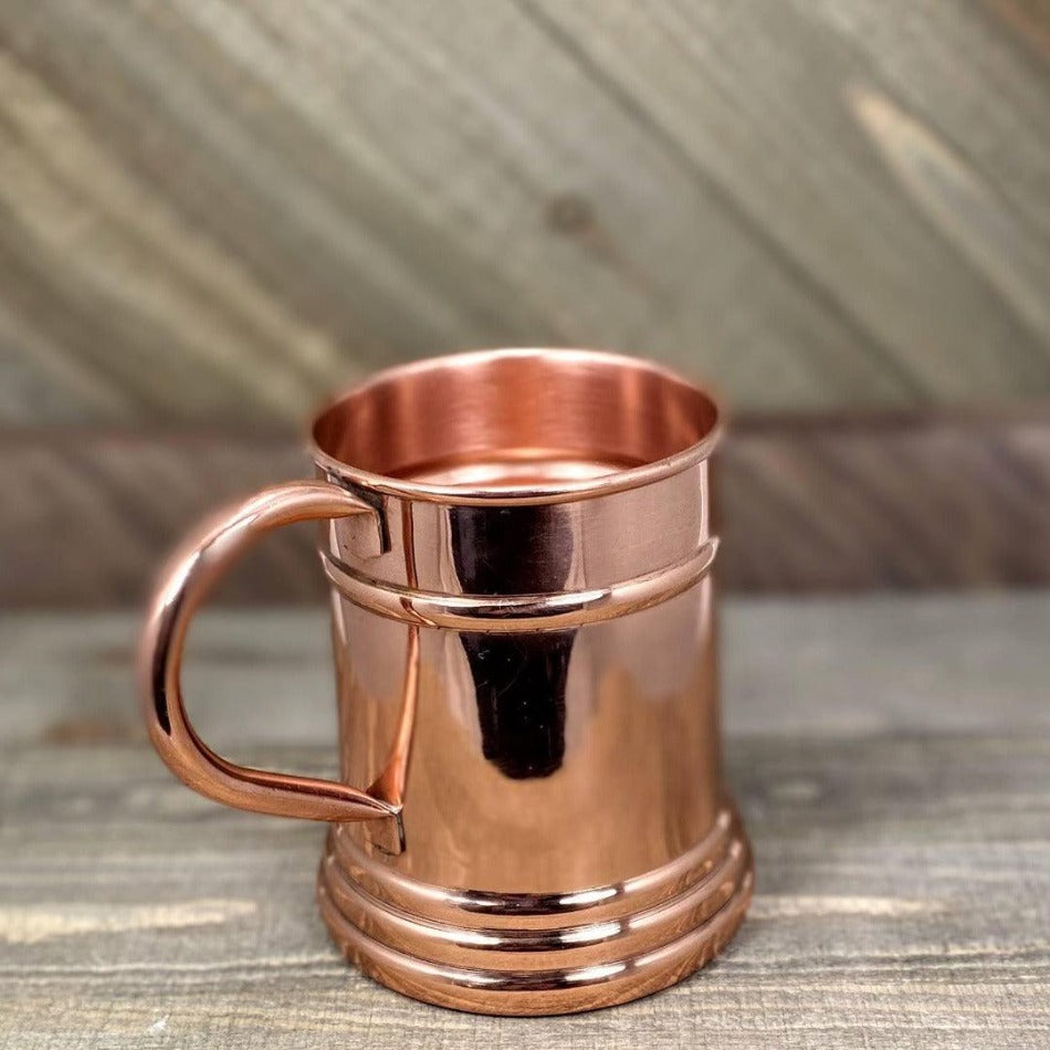 
                      
                        Sip a favorite ale or lager from this Stein Copper Moscow Mule Beer Mug for an exceptional 16-ounce drinking experience. With its classic copper style, pair it with our Leather Beer Journal for an unparalleled drinking experience in any setting! Stein Copper Moscow Mule Beer Mug - Fish On! Custom Rods
                      
                    